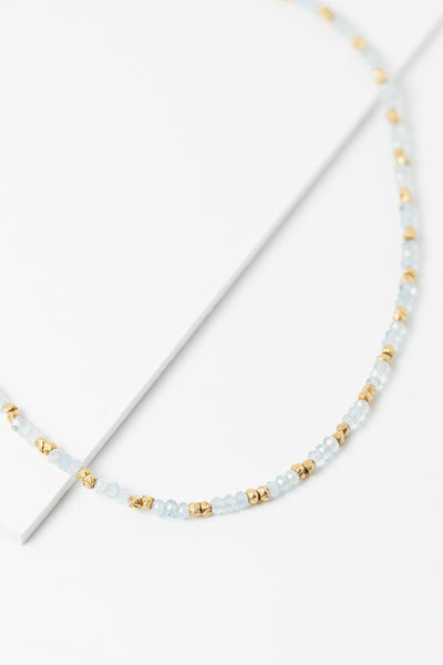 Detail view of Aquamarine and gold beaded necklace by Alison Jefferies for J'Adorn Designs jewelry