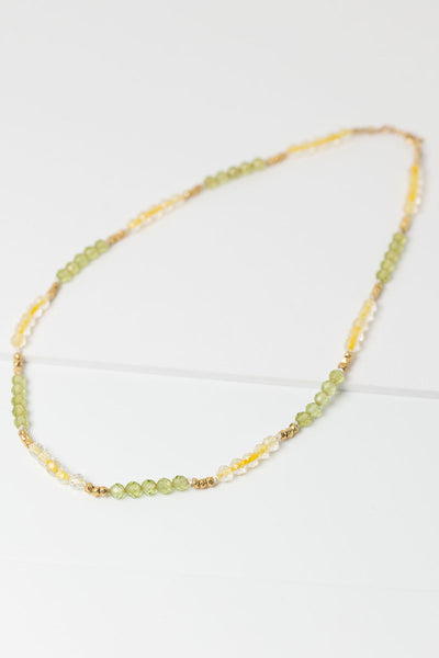 Citrine and peridot beaded gemstone necklace with gold beads. Strung gemstone layering necklace by artist Alison Jefferies for J'Adorn Designs jewelry