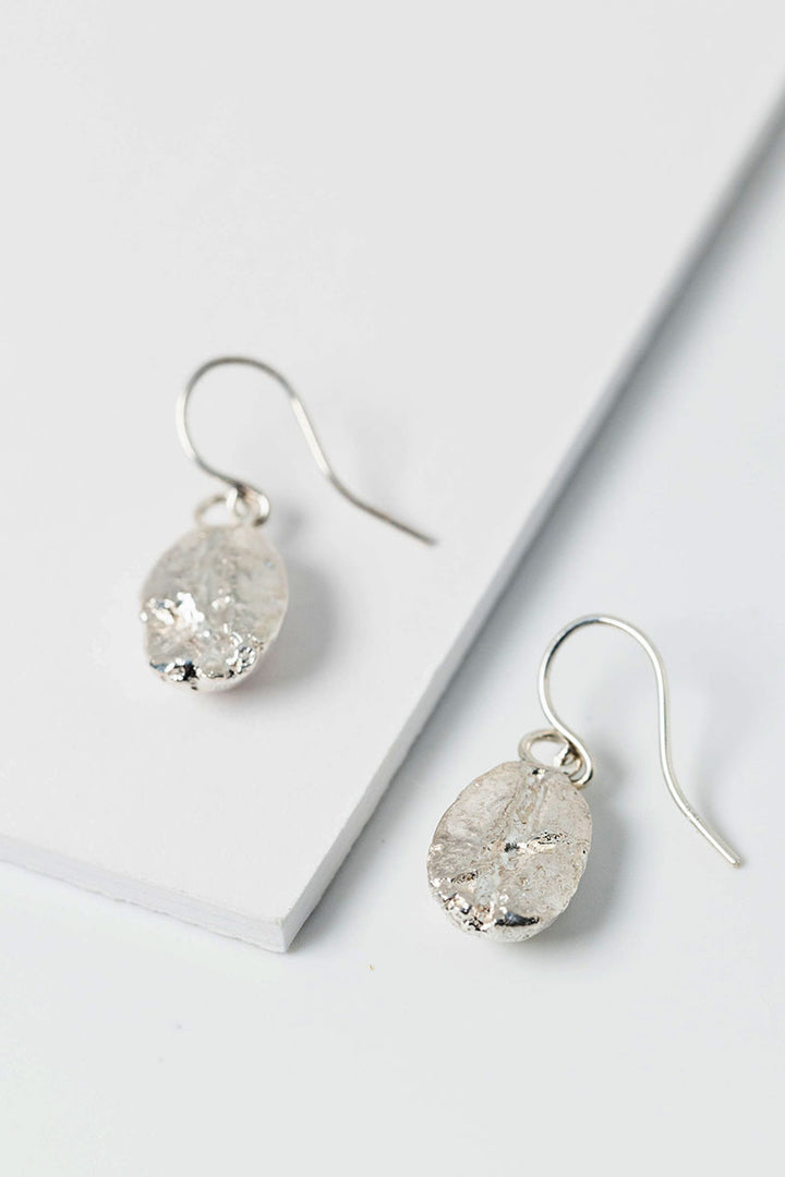 Sterling silver coffee bean drop earrings. Unisex artisan fine jewelry by Alison Jefferies for J'Adorn Designs handcrafted jewelry.