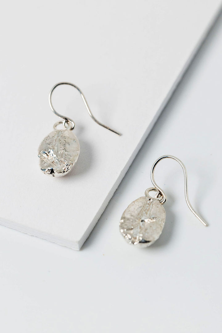Sterling silver coffee bean drop earrings. Unisex artisan fine jewelry by Alison Jefferies for J'Adorn Designs handcrafted jewelry.