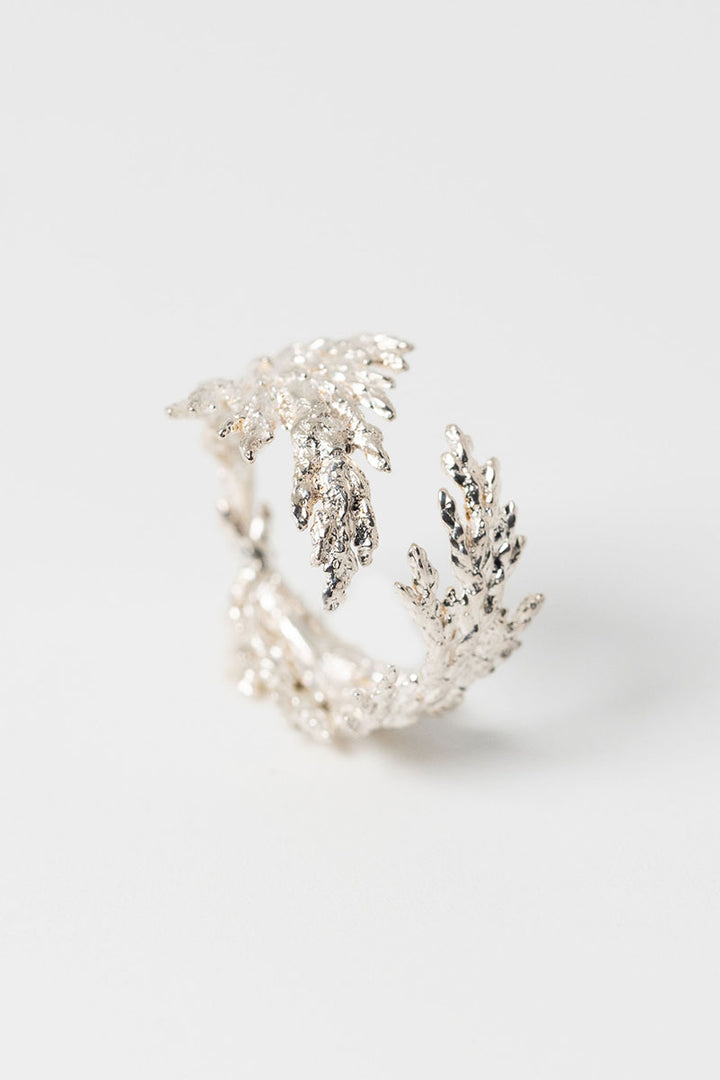 Sterling silver evergreen leaf ring, adjustable juniper leaf ring made from nature by custom jewelry artist Alison Jefferies for J'Adorn Designs