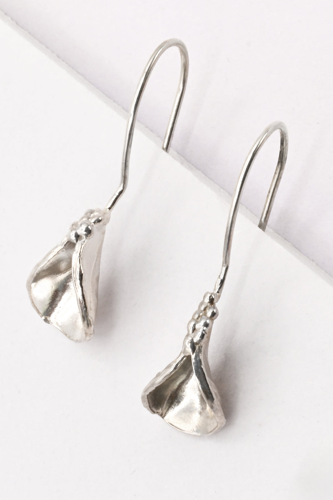 Silver Petal Drop Earrings by J'Adorn Designs
