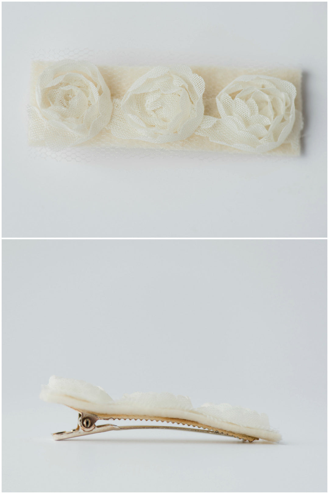 Couture flower girl hair clip appropriate for young girls toddler to tween. Ivory fabric rosettes over felt attached to silver plated clip. Made by hand by J'Adorn Designs, Baltimore Maryland couture and custom jewelry studio, photography by Nichole Rosado Meredith
