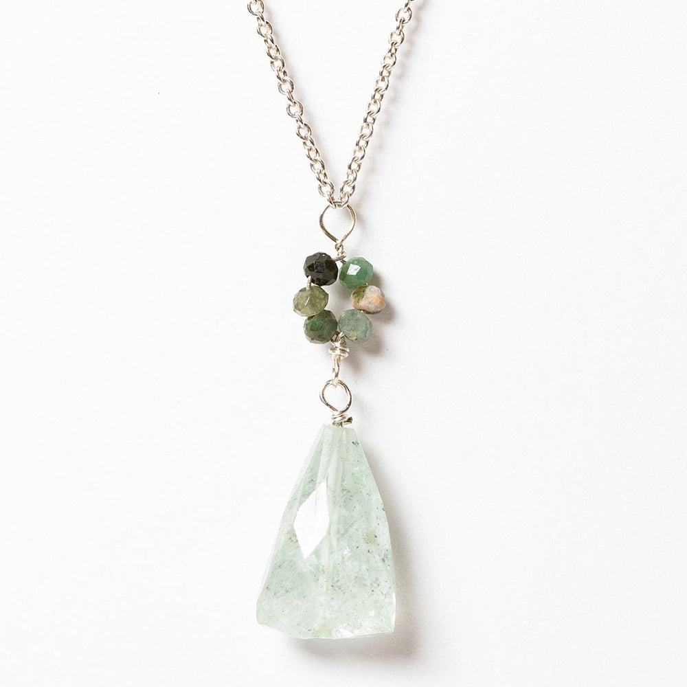 Oceanic pendant necklace in silver with a blue and green "flower" pendant and long light blue faceted drop pendant. Sterling silver necklace in cool ocean colors, handcrafted by J'Adorn Designs artisan Alison Jefferies