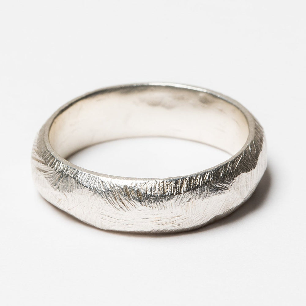 Sterling silver textured angles unisex ring band made by lost wax casting.  Handcrafted artisan jewelry by J'Adorn Designs artisan Alison Jefferies.