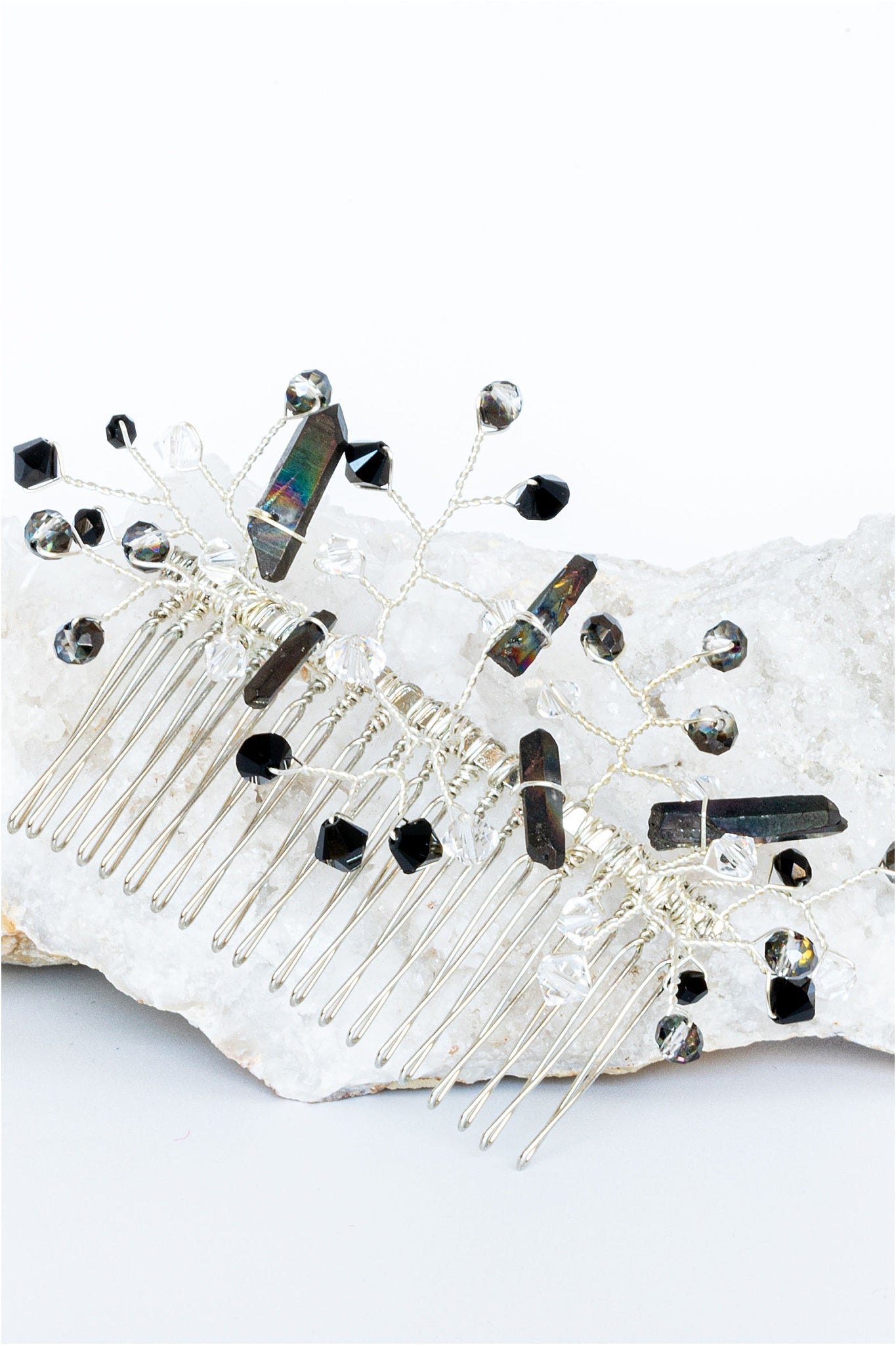 Black and silver bridal hair comb with iridescent black crystal spikes and "vines" with silver and black crystal accents.