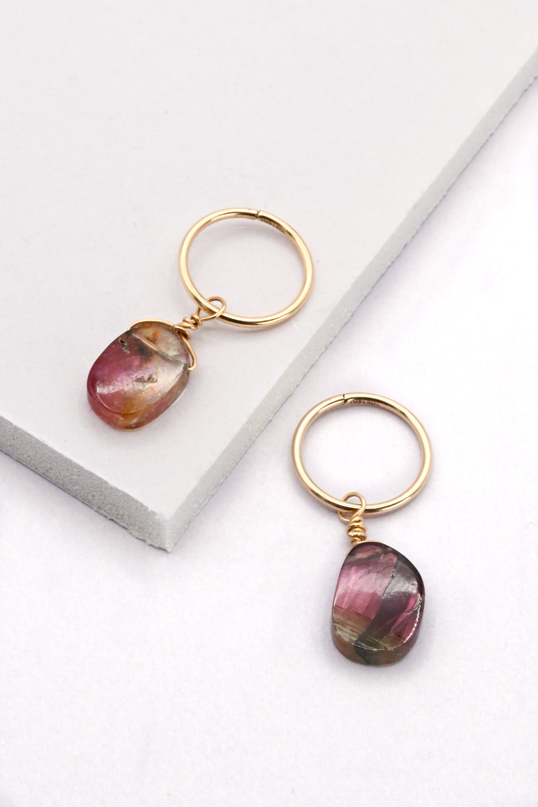 Medium sized gold huggie hoop earrings with watermelon tourmaline charms by J'Adorn Designs handcrafted jewelry 