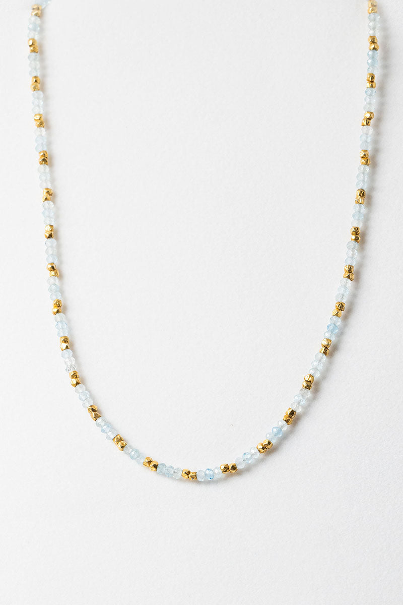 Front view of faceted aquamarine and gold beaded necklace by Alison Jefferies for J'Adorn Designs jewelry