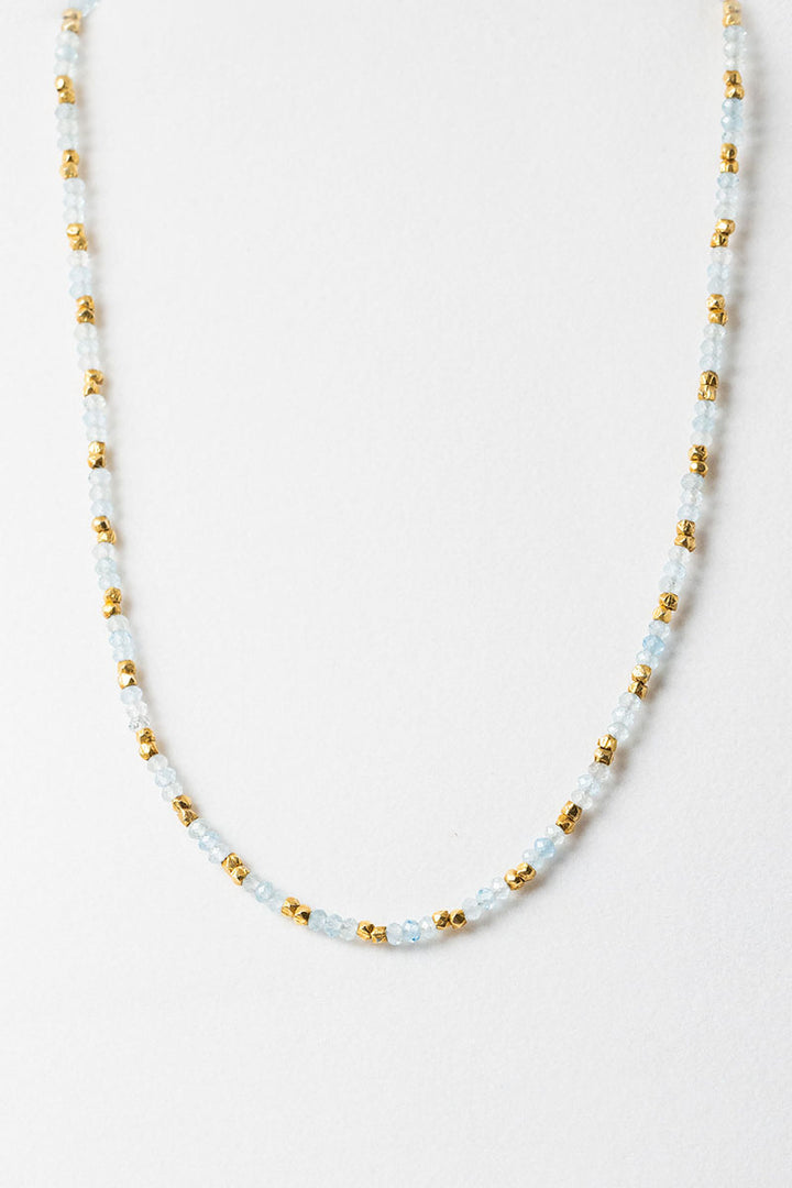 Front view of faceted aquamarine and gold beaded necklace by Alison Jefferies for J'Adorn Designs jewelry