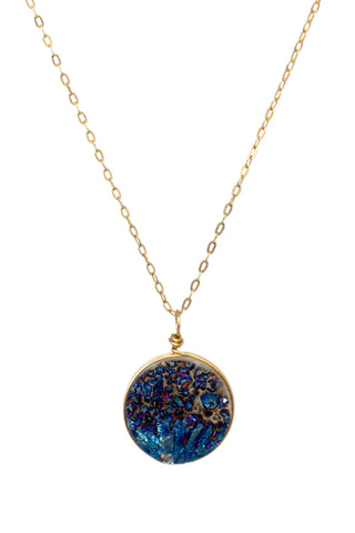 Round blue violet druzy gemstone pendant necklace with delicate gold chain. Handcrafted druzy jewelry by J'Adorn Designs jewelry artisan Alison Jefferies
