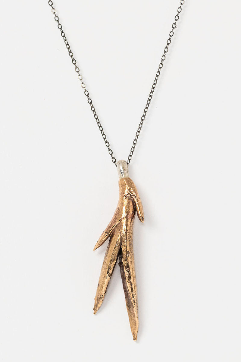 Bronze aloe plant pendant necklace with oxidized silver chain by jewelry artist Alison Jefferies for J'Adorn Designs