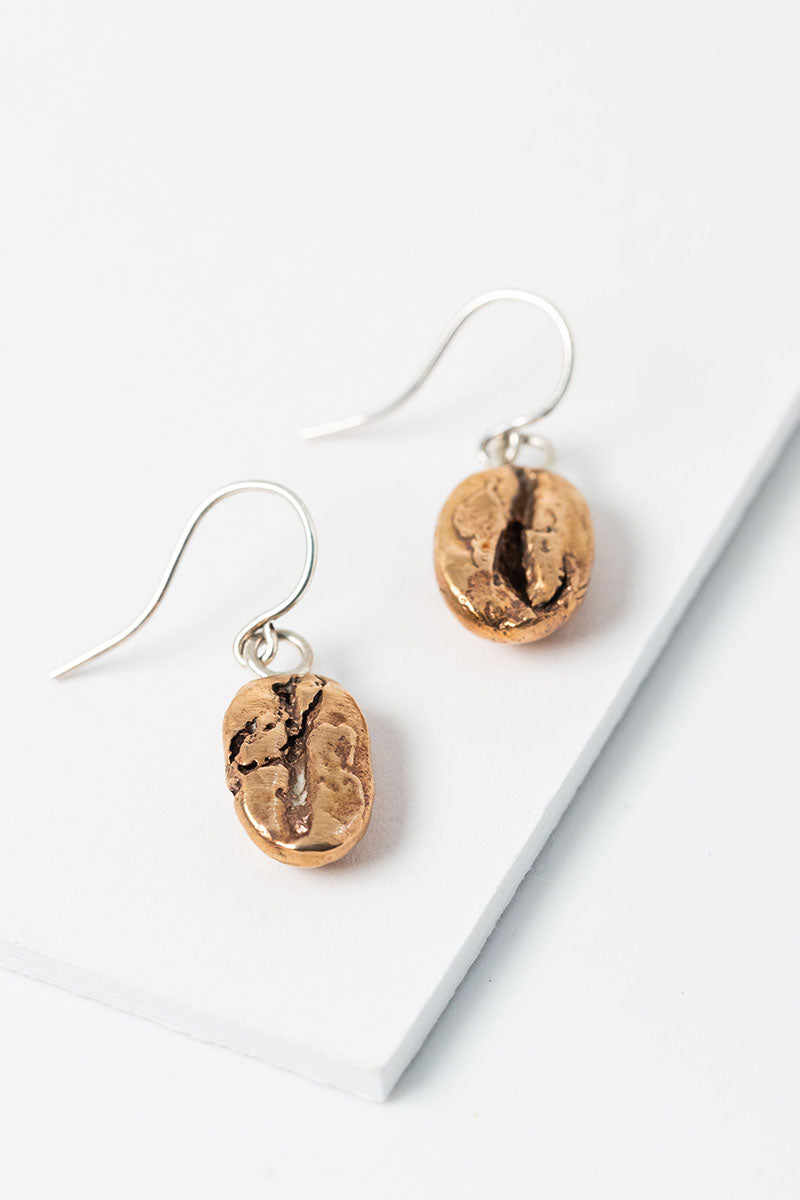 Bronze coffee bean drop earring pair with sterling silver earrings; handcrafted unisex earrings by Alison Jefferies for J'Adorn Designs artisan jewelry, made in Baltimore. 
