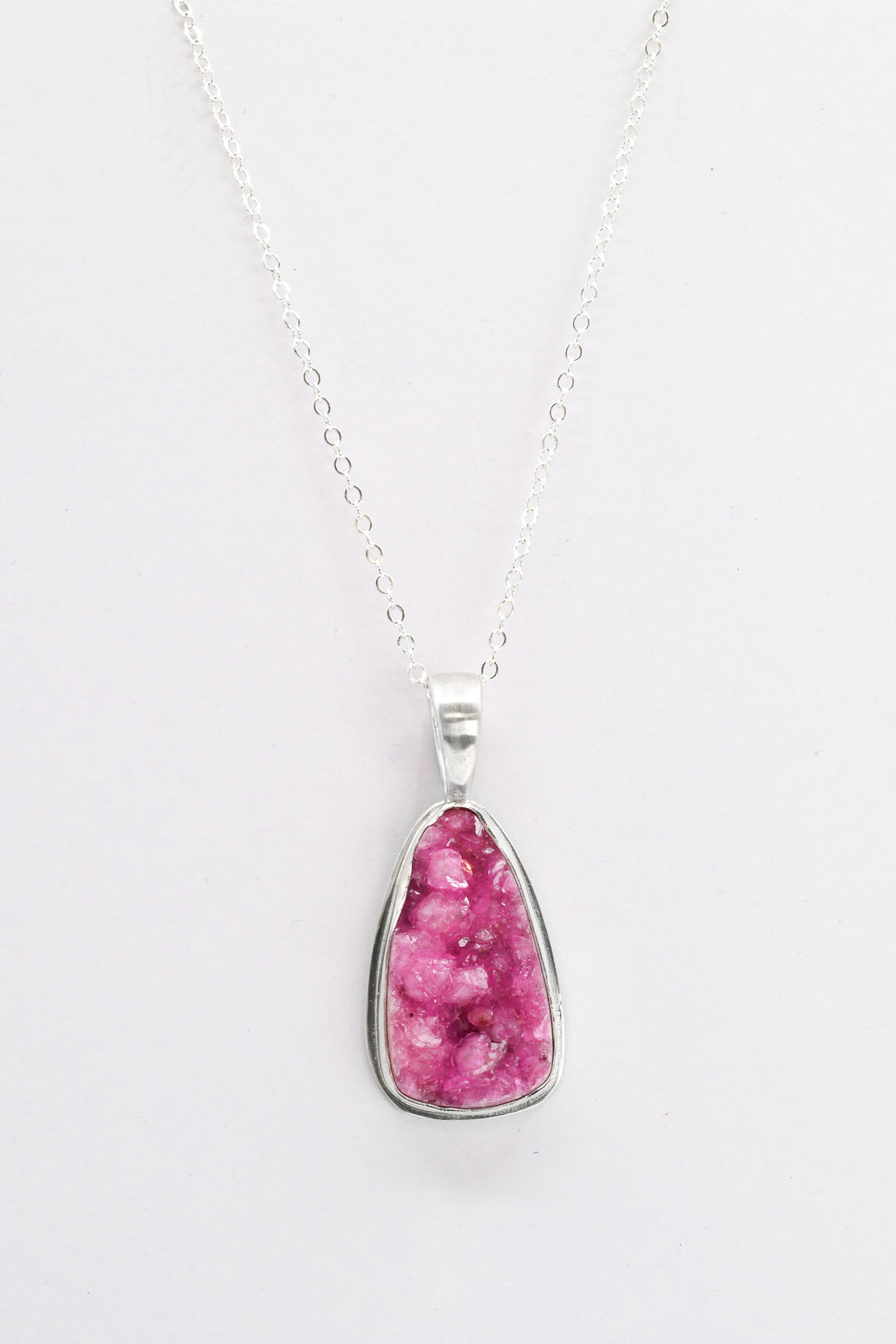 Hot pink triangle cobaltocalcite pendant on a delicate sterling silver chain