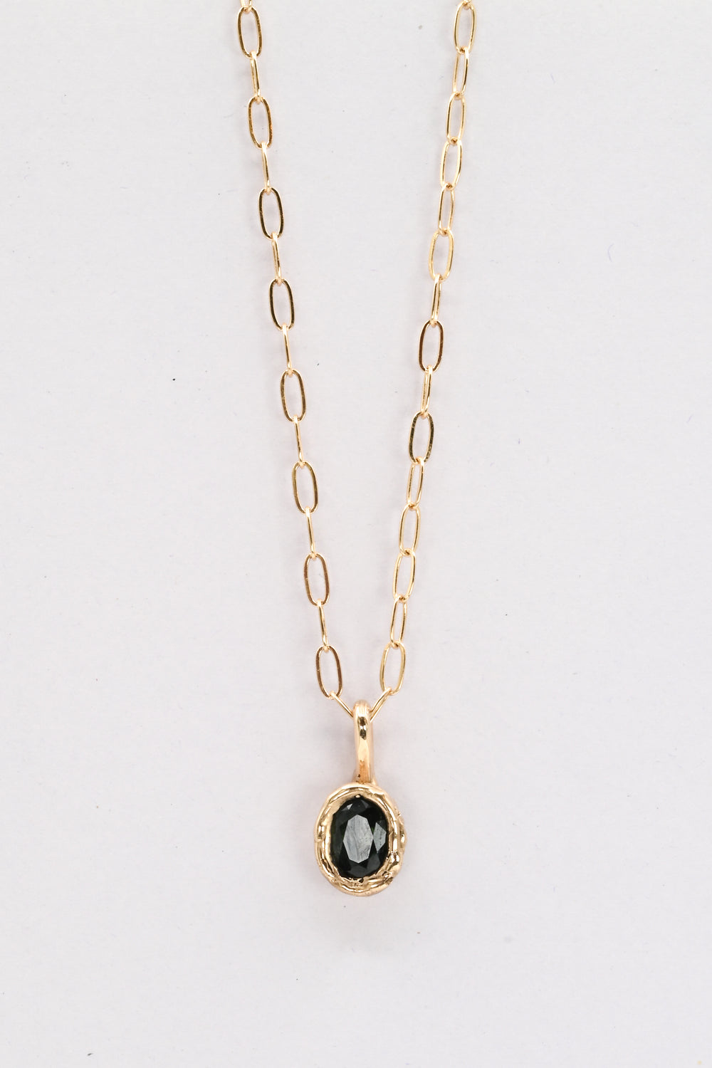 Dark green oval sapphire in a 14k gold setting on a gold paperclip chain, by J'Adorn Designs