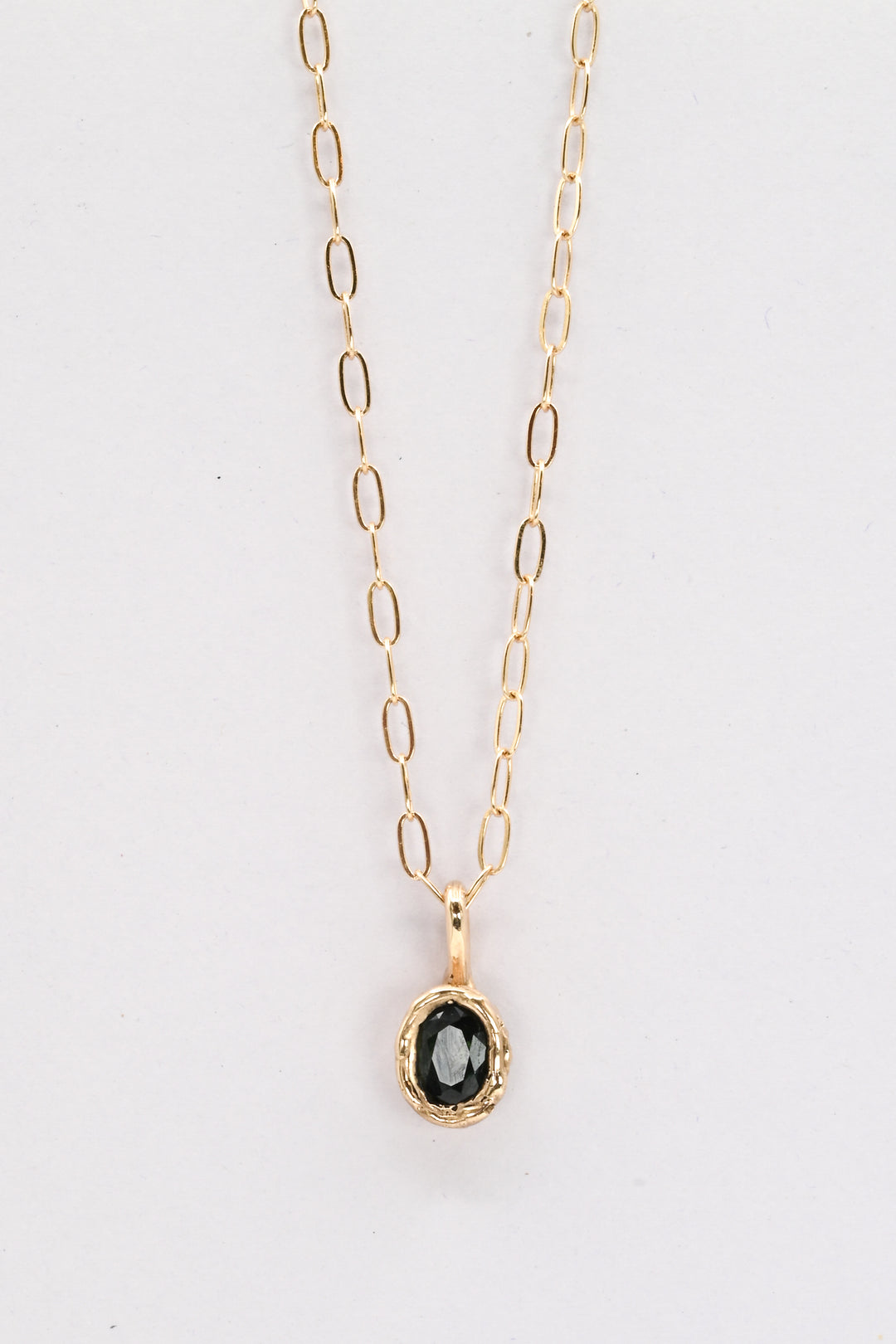 Dark green oval sapphire in a 14k gold setting on a gold paperclip chain, by J'Adorn Designs