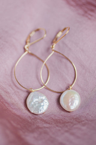 Delicate gold hoop earrings with white freshwater coin pearl drops, hand crafted jewelry by Alison Jefferies of J'Adorn Designs