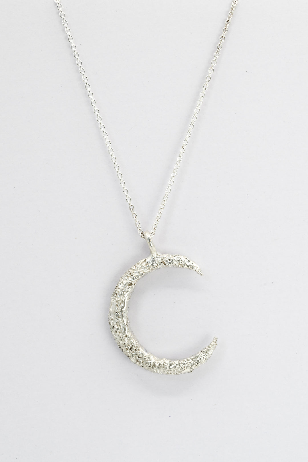 Large Silver Moon Pendant with crater texture on a delicate sterling silver chain