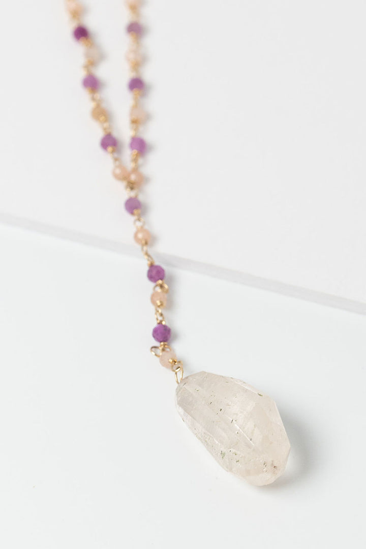 Pink and gold lariat necklace with ruby, peach moonstone, and pink aquamarine beads. Handmade artisan jewelry by Alison Jefferies for J'Adorn Designs.