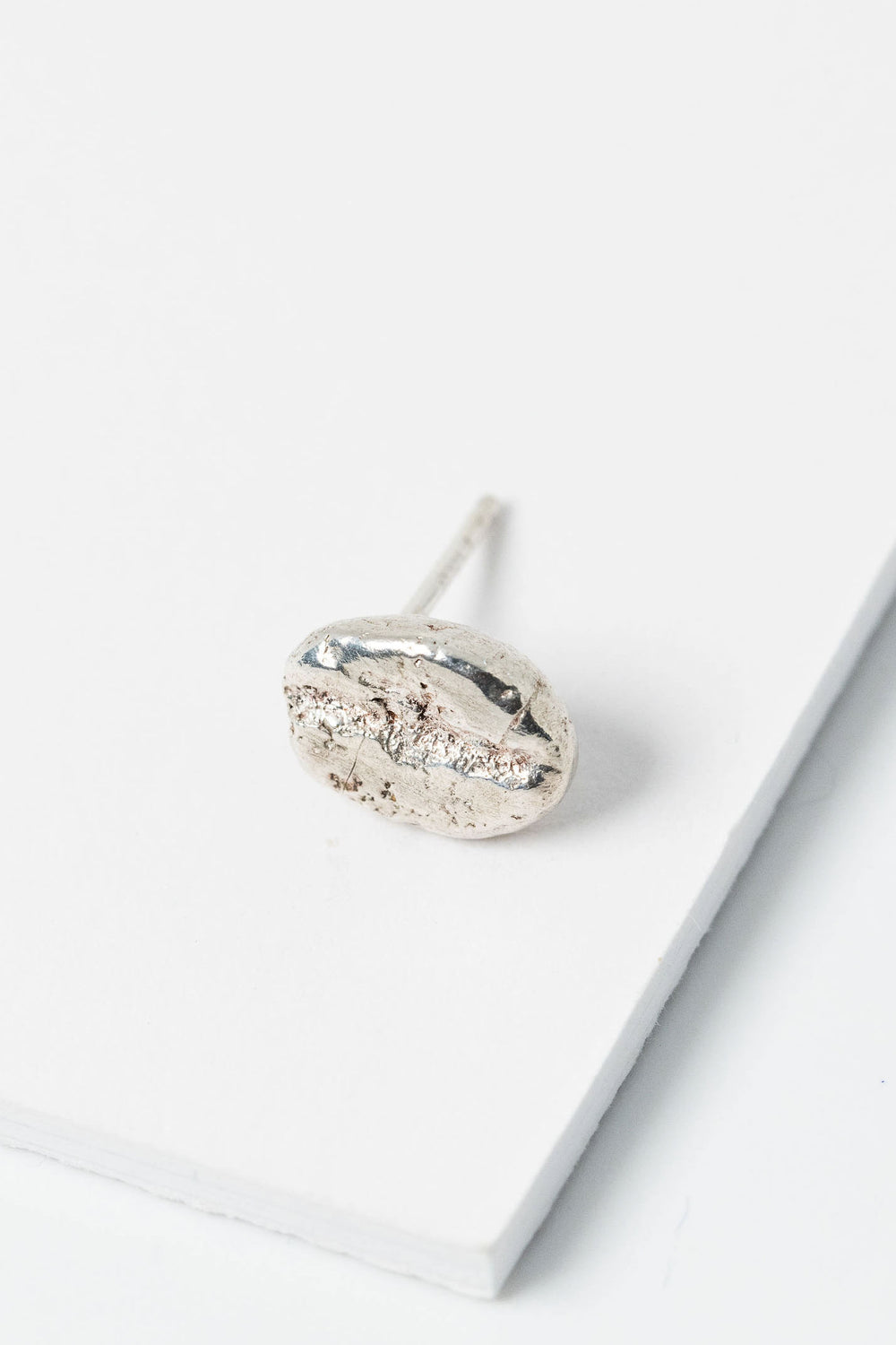 Sterling silver coffee bean stud earring; single post earring for mix and match style and gender inclusive fashion.