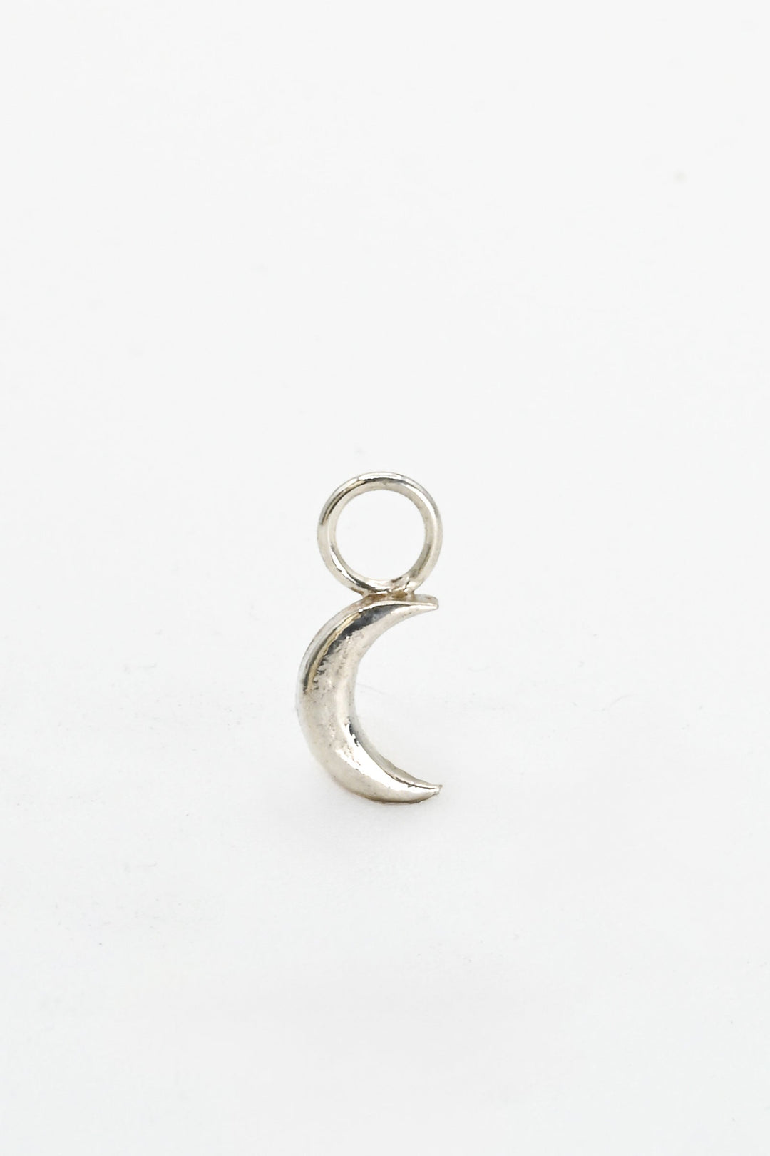 Tiny sterling silver crescent moon charm for a hoop earring, charm bracelet, or charm necklace, by J'Adorn Designs