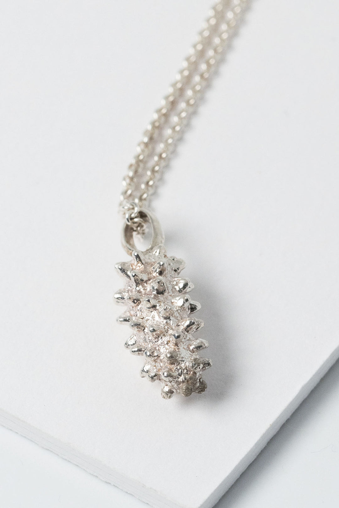 Sterling silver peace lily pendant necklace. Natural object jewelry collection taken from nature by Alison Jefferies for J'Adorn Designs custom jewelry.