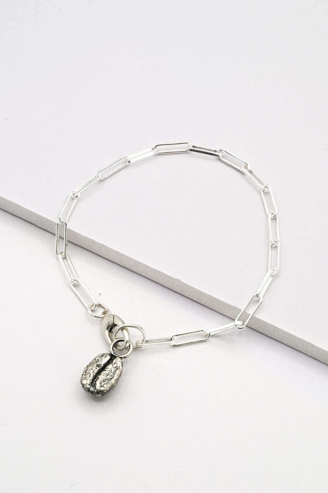 Silver paperclip chain with charm holder clasp and silver coffee bean charm by J'Adorn Designs