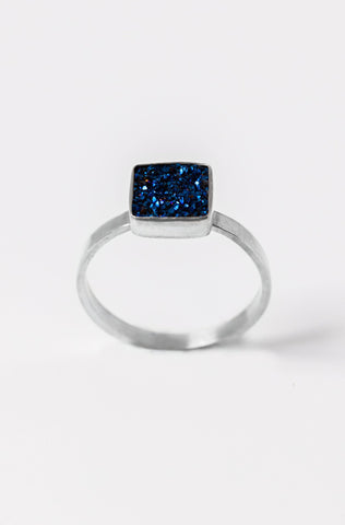 Sterling silver bezel ring with dark blue square druzy solitaire. Handcrafted silver and druzy ring by Alison Jefferies for J'Adorn Designs jewelry.