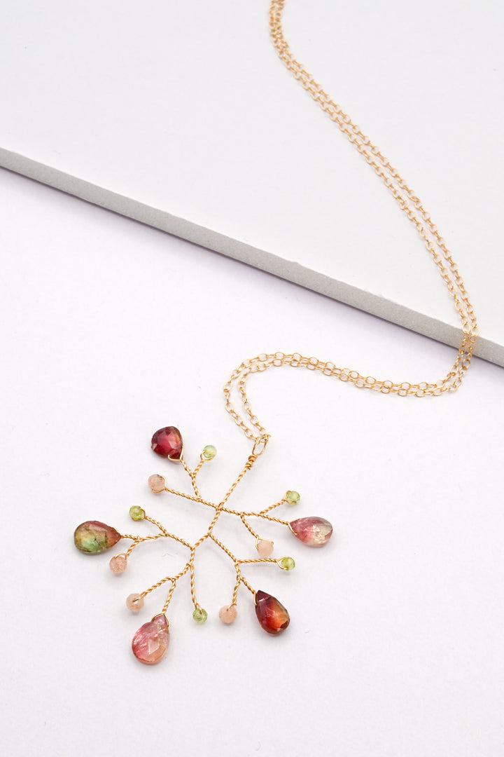 Watermelon tourmaline wire branch pendant necklace on a white background, by J'Adorn Designs.
