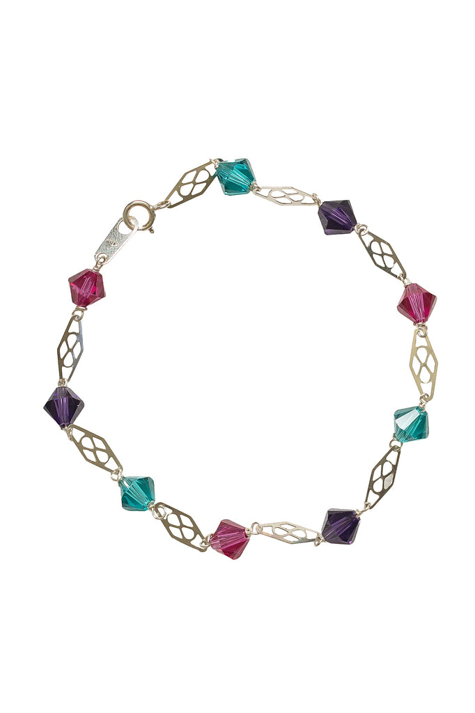 Delicate silver link bracelet for stacking or wedding jewelry. Jewel tone Swarovski crystals in pink, purple, and turquoise with silver filigree links. Mermaid colors silver bracelet. Artisan jewelry and luxury bridal accessories handmade in Maryland by Alison Jefferies of J'Adorn Designs.