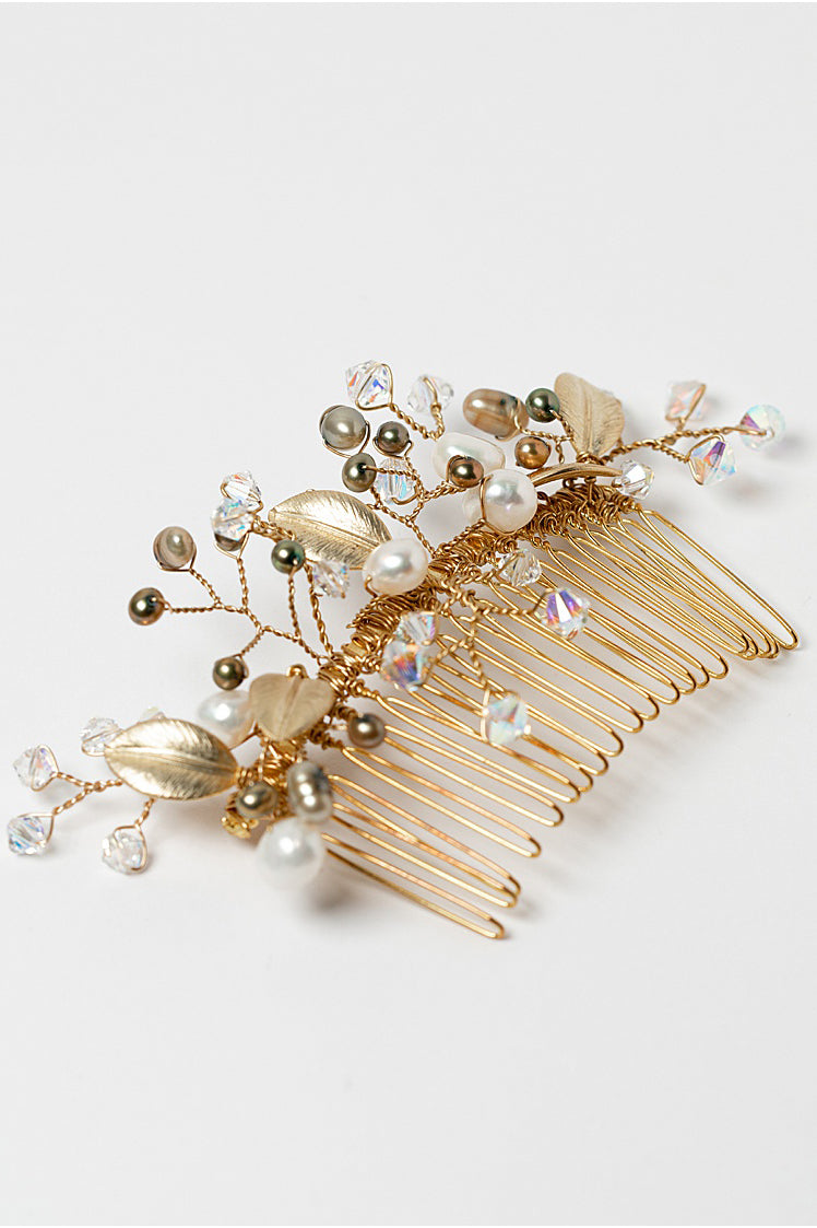 Gold Leaves Hair Comb: an heirloom quality handcrafted bridal hair comb made with Swarovski crystals, genuine freshwater pearls in ivory and green, and matte textured golden leaves on a shiny gold comb. A flexible wedding hair accessory made to last, by Alison Jefferies of J'Adorn Designs custom jewelry and modern wedding accessories.
