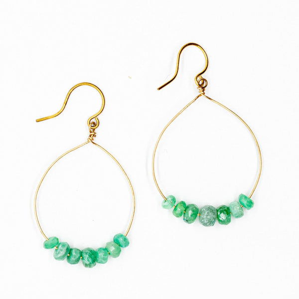 One pair of handcrafted gold hoop earrings with emerald gemstone beads. May birthstone earrings by J'Adorn Designs jewelry designer Alison Jefferies