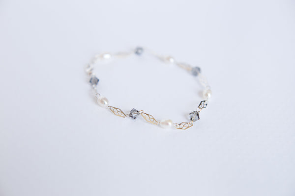 Delicate silver freshwater pearl bracelet with filigree links by J'Adorn Designs custom jewelry