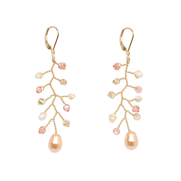 Delicate gold vine earrings in peach and blush crystals with freshwater pearl accents. Handcrafted bridal earrings for a bride or wedding party gifts, made by J'Adorn Designs artisan jewelry made in Baltimore, Maryland.