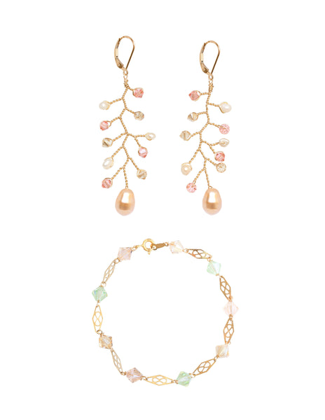 Peach and blush jewelry set featuring pretty crystal and pearl vine earrings and a delicate gold link bracelet with pastel rainbow colored crystals. Jewelry gift set for women, brides, and wedding party by J'Adorn Designs artisan jewelry.