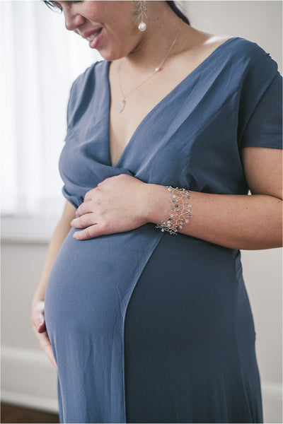 Maternity portrait featuring an intricate aquamarine and silver pearl vine bracelet. Handcrafted jewelry for luxury weddings and fashion by J'Adorn Designs artisan jeweler Alison Jefferies of Baltimore, Maryland.