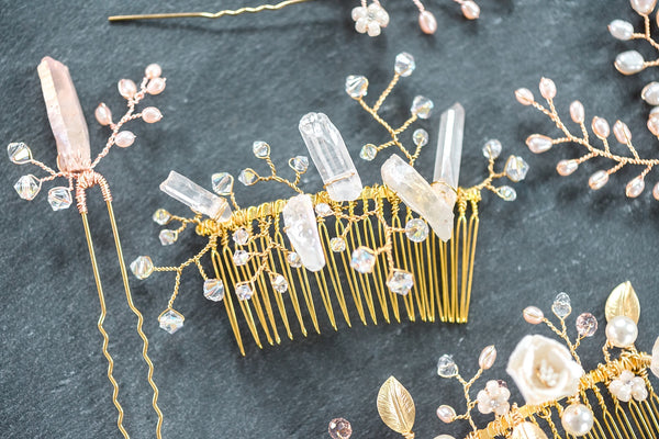 Raw crystal quartz spikes bridal hair comb on a slate grey background with other bridal hair pieces, handcrafted heirloom quality hair accessories with real gemstones and pearls by J'Adorn Designs artisan Alison Jefferies