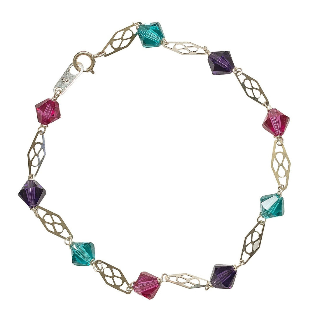 Delicate silver link bracelet for stacking or wedding jewelry. Jewel tone Swarovski crystals in pink, purple, and turquoise with silver filigree links. Mermaid colors silver bracelet. Artisan jewelry and luxury bridal accessories handmade in Maryland by Alison Jefferies of J'Adorn Designs.