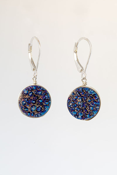 Round blue violet druzy gemstone earrings with sterling silver wire wrapping and leverback earring hooks. Handcrafted druzy jewelry by J'Adorn Designs jewelry artisan Alison Jefferies