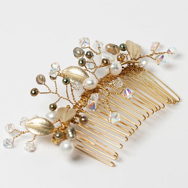 Gold Leaves Hair Comb: an heirloom quality handcrafted bridal hair comb made with Swarovski crystals, genuine freshwater pearls in ivory and green, and matte textured golden leaves on a shiny gold comb. A flexible wedding hair accessory made to last, by Alison Jefferies of J'Adorn Designs custom jewelry and modern wedding accessories.
