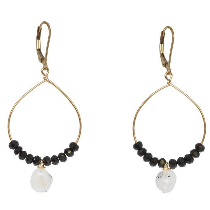 Black and gold handcrafted hoop earrings for sale. A pair of delicate gold hoops with black spinel and moonstone bead accents for luxury fashion or a jewelry gift idea. Artisan jewelry and luxury bridal accessories handmade in Maryland by Alison Jefferies of J'Adorn Designs.