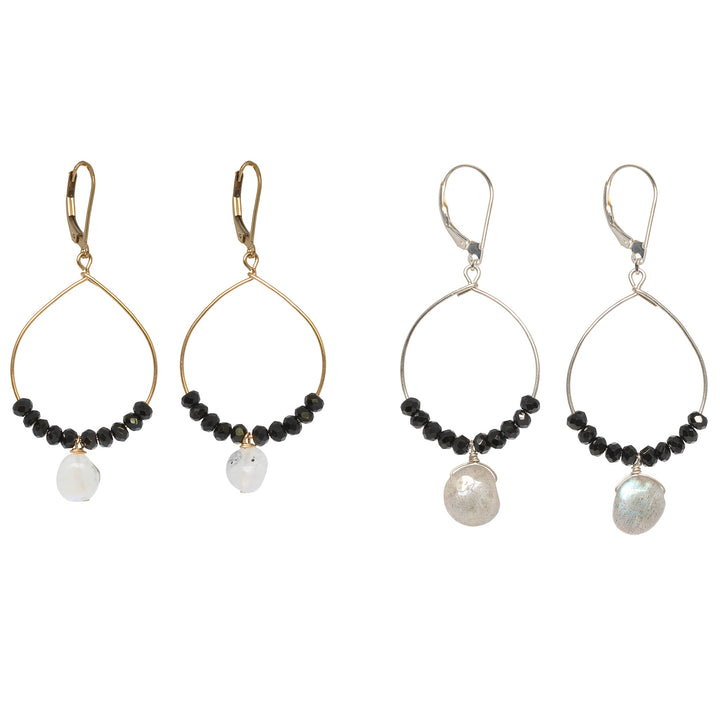 Two pairs of fine handcrafted hoop earrings. A pair of black and gold handcrafted hoop earrings with another pair of silver hoops with labradorite drops. Delicate gold and silver hoops for luxury fashion or a jewelry gift idea. Artisan jewelry and luxury bridal accessories handmade in Maryland by Alison Jefferies of J'Adorn Designs.