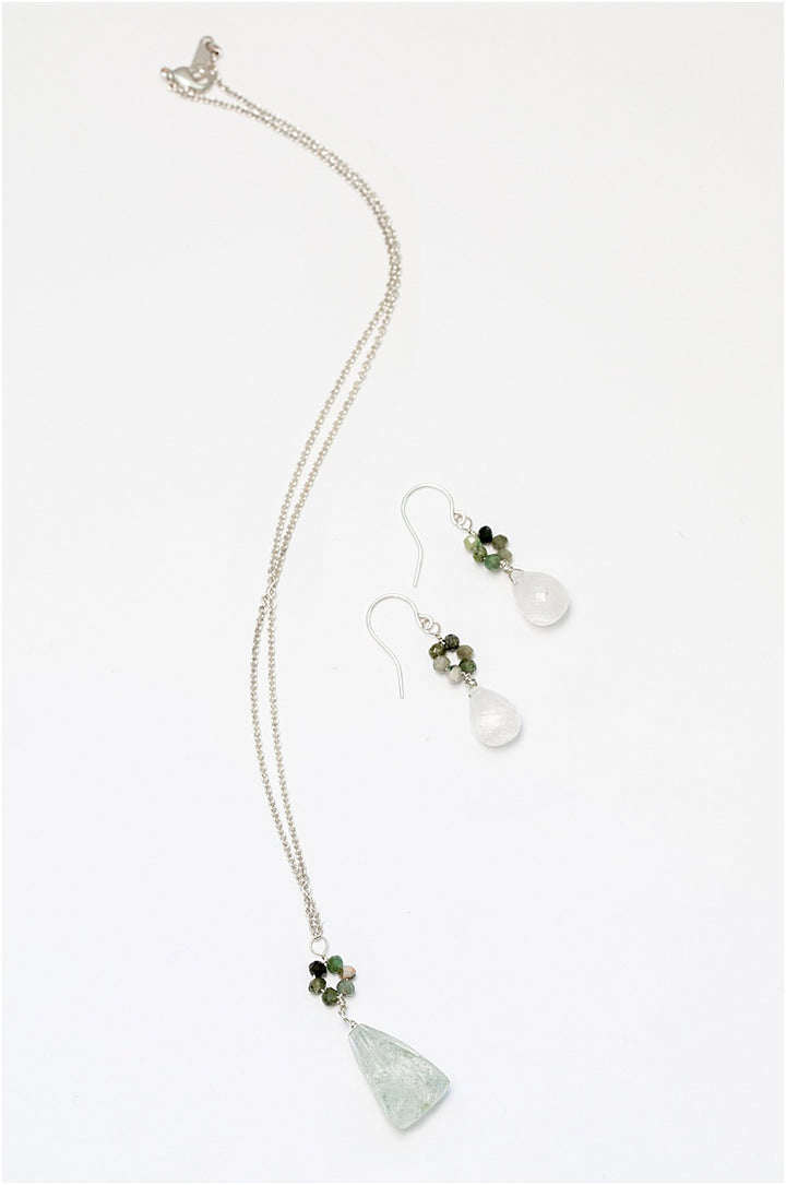 Oceanic pendant necklace in silver with a blue and green "flower" pendant and long light blue faceted drop pendant. Sterling silver necklace in cool ocean colors, handcrafted by J'Adorn Designs artisan Alison Jefferies