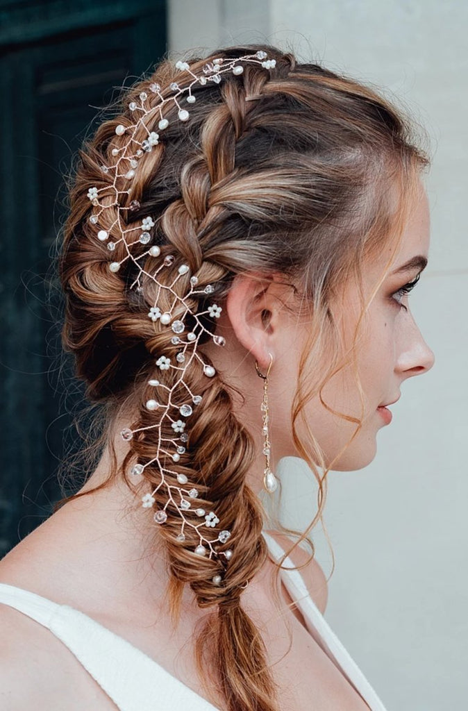 Delicate bridal vine for wedding hairstyle, cascading hair vine on a braided bridal hair style, handcrafted wedding hair accessories by J'Adorn Designs handcrafted jewelry