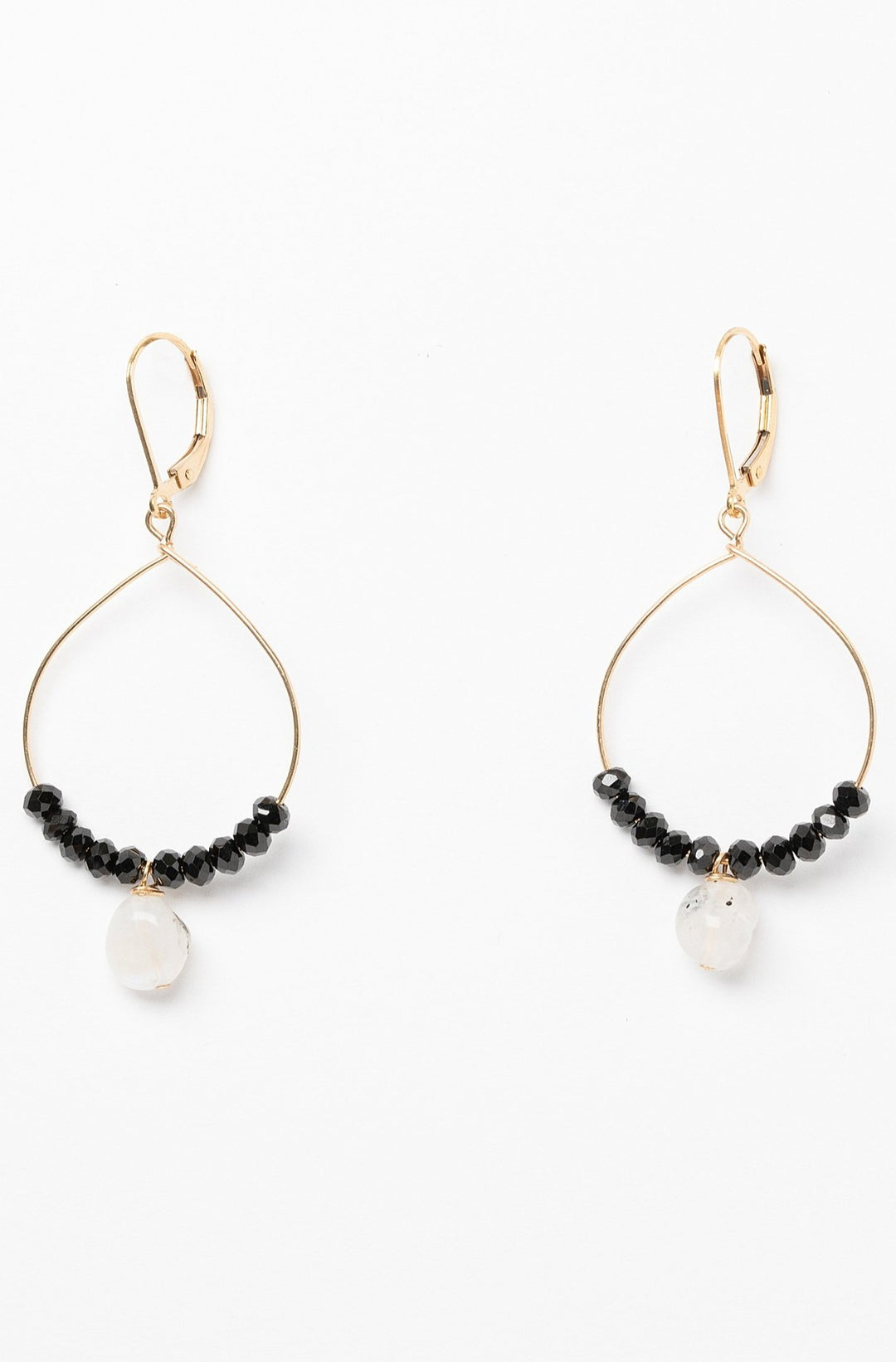 Black and gold handcrafted hoop earrings for sale. A pair of delicate gold hoops with black spinel and moonstone bead accents for luxury fashion or a jewelry gift idea. Artisan jewelry and luxury bridal accessories handmade in Maryland by Alison Jefferies of J'Adorn Designs.
