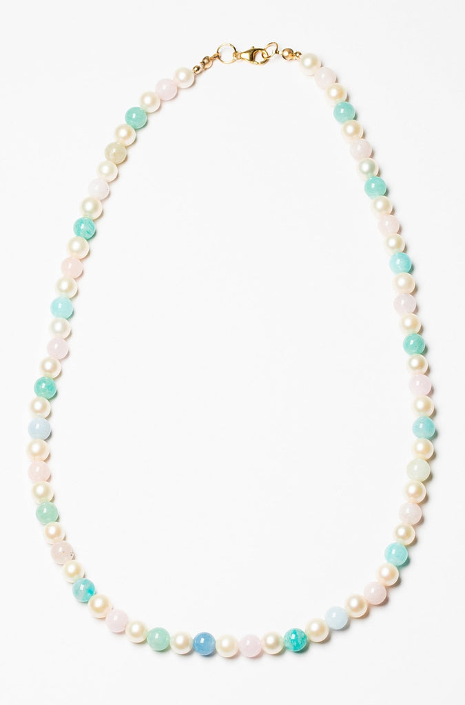 One handcrafted strung pearl necklace in rainbow pastel colors, made with white freshwater pearls and beryl beads with a 14k gold filled clasp. Artisan jewelry and luxury bridal accessories handmade in Maryland by Alison Jefferies of J'Adorn Designs.
