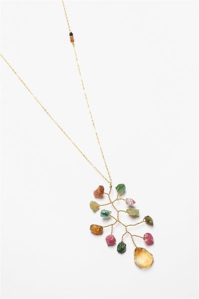 Long asymmetrical necklace with rough rainbow tourmaline and citrine gemstones in a wire wrapped branch design made by J'Adorn Designs artisan Alison Jefferies of Baltimore, MD.