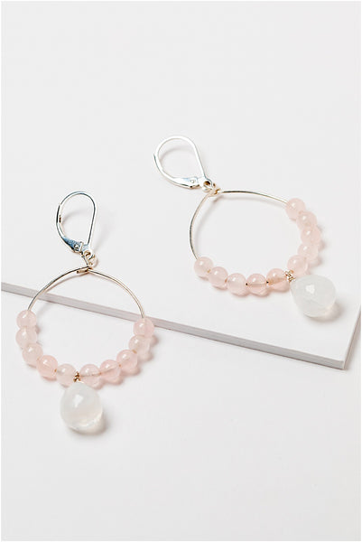 Lightweight silver hoop earrings with rose quartz beads and faceted moonstone teardrops. Pink and white gemstones on a thin silver hoop earrings. Handcrafted jewelry and modern bridal accessories by J'Adorn Designs artist Alison Jefferies.